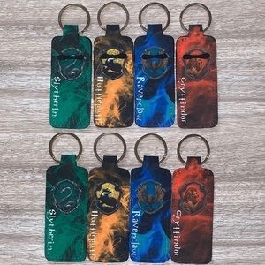 Harry Potter Hogwarts house chapstick holder new- choose 1